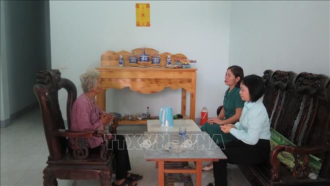 Do Thi Chac in Van Ban district has her new house completed in late September. VNA Photo: Hương Thu 