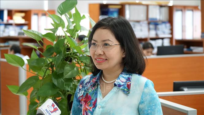 Giám đốc Sở Công Thương thành phố Đà Nẵng Lê Thị Kim Phương cho rằng, các lĩnh vực công thương sẽ được hưởng lợi từ Nghị quyết 136. Ảnh: Quốc Dũng - TTXVN