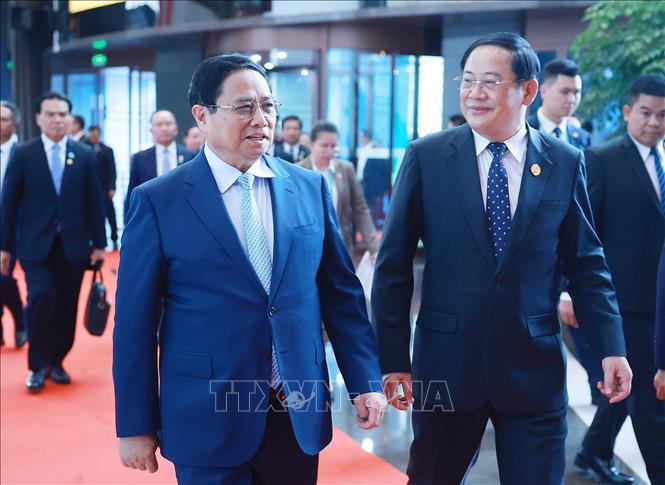Prime Minister meets Lao counterpart in China - VNA Photos - Vietnam ...