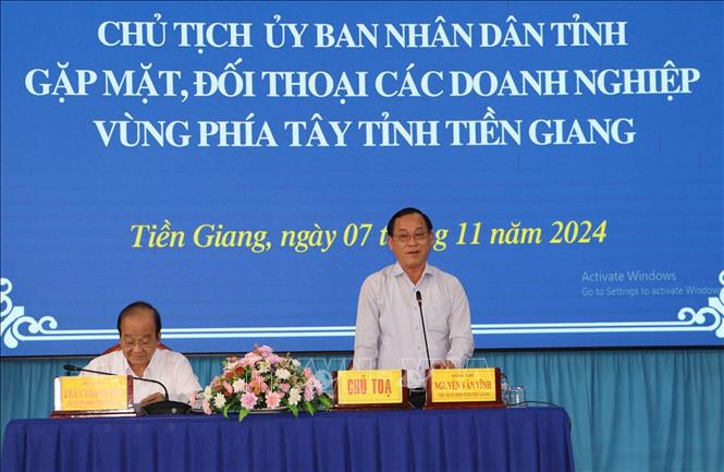 Chủ tịch UBND tình Tiền Giang Nguyễn Văn Vĩnh phát biểu tại buổi gặp gỡ. Ảnh: Minh Trí - TTXVN