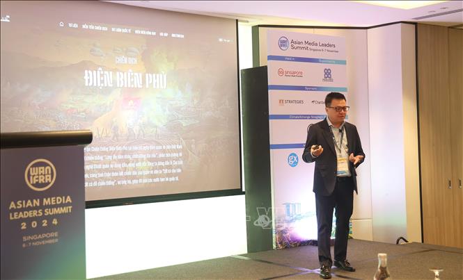 Le Quoc Minh, Editor-in-chief of the Nhan dan newspaper, speaks at the summit. VNA Photo: Tất Đạt 