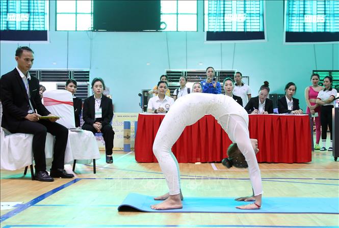 Vận động viên nữ tranh tài nội dung Yoga cá nhân. Ảnh: Trần Lê Lâm - TTXVN 