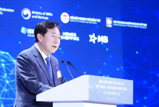 Ông Kim Ki Moon, Chủ tịch Hiệp hội Doanh nghiệp Nhỏ và Vừa Hàn Quốc (KBIZ) phát biểu. Ảnh: Tuấn Anh - TTXVN 