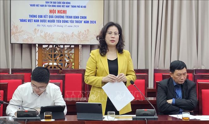 Bà Nguyễn Kiều Oanh, Phó Giám đốc phụ trách Sở Công thương Hà Nội, báo cáo tại Hội nghị. Ảnh: Phương Anh-TTXVN