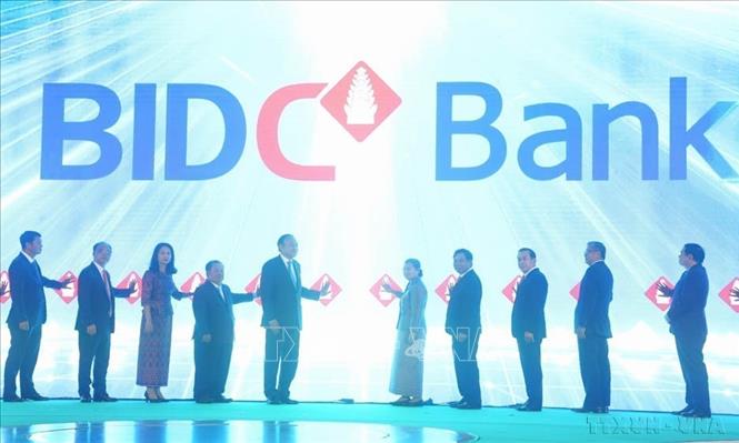 Công bố nhận diện thương hiệu mới của BIDC tại Lễ kỷ niệm 15 năm thành lập Ngân hàng Đầu tư và Phát triển Campuchia. BIDC là pháp nhân ngân hàng độc lập 100% vốn của Nhà nước Việt Nam, trong đó Ngân hàng Đầu tư và Phát triển Việt Nam (BIDV) đóng vai trò nòng cốt và chủ đạo (Campuchia, 9/6/2024). Ảnh: Hoàng Minh - TTXVN