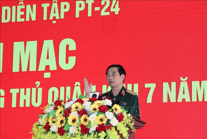 Đại tướng Phan Văn Giang, Uỷ viên Bộ Chính trị, Bộ trưởng Bộ Quốc phòng phát biểu tại buổi khai mạc. Ảnh: Huyền Trang - TTXVN