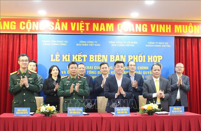 Lễ ký kết biên bản phối hợp. Ảnh: Nguyễn Thắng - TTXVN