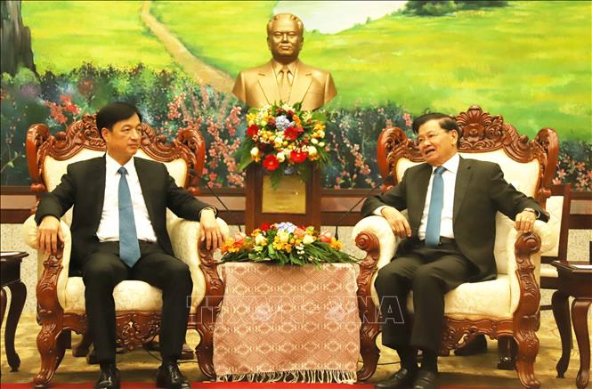 Tổng Bí thư, Chủ tịch nước Lào Thongloun Sisulith tiếp đồng chí Nguyễn Duy Ngọc, Bí thư Trung ương, Chánh Văn phòng Trung ương Đảng. Ảnh: Xuân Tú - PV TTXVN tại Lào