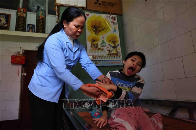 Tại mái ấm này, tình thương không có biên giới. Ảnh: Minh Đức – TTXVN
