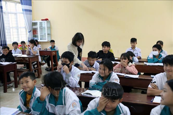 396/396 học sinh trường THCS Đức Lý (huyện Lý Nhân) đã tham gia bảo hiểm ye tế học sinh sinh viên. Ảnh: Đại Nghĩa - TTXVN