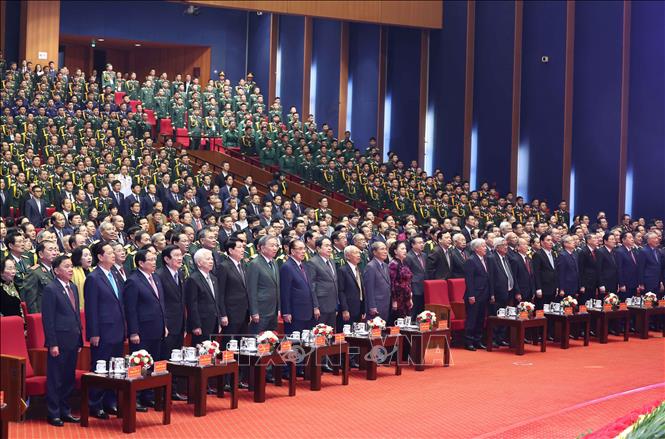Tổng Bí thư Tô Lâm và các đại biểu thực hiện nghi lễ chào cờ. Ảnh: Thống Nhất – TTXVN