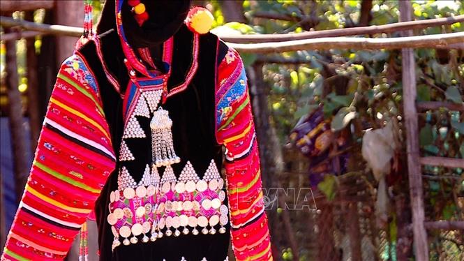 A brassier with elaborate patterns, silver buttons and silver coins requires a lot of time to be completed. VNA/Photo by courtesy  