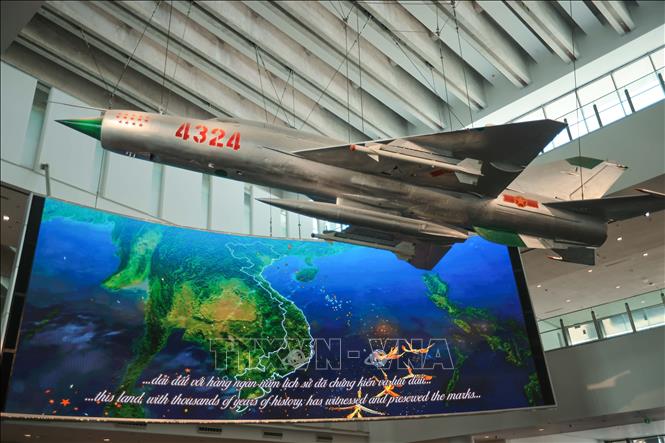 A MiG-21 with serial number 4324 that had shot down enemy’s aircraft 14 times, receiving 14 stars on its body.  VNA Photo: Hoàng Hiếu