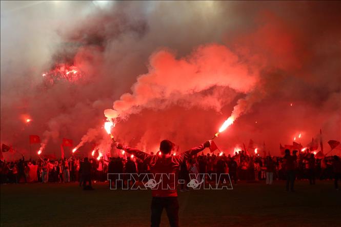 Vietnamese fans in Hai Phong city cheer for the national team. VNA Photo