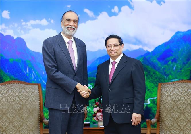 Prime Minister Pham Minh Chinh receives UN Under-Secretary-General and Secretary General's Envoy on Technology Amandeep Singh Gill. VNA Photo: Dương Giang 