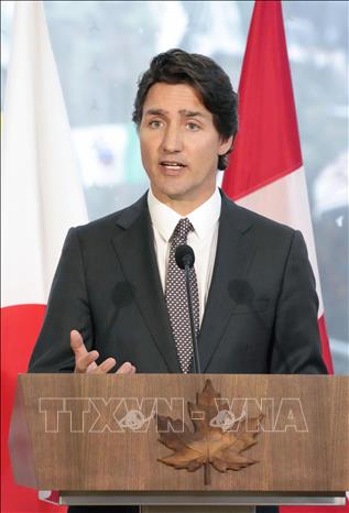 Thủ tướng Canada Justin Trudeau trong cuộc họp báo tại Ottawa. Ảnh: Kyodo/TTXVN