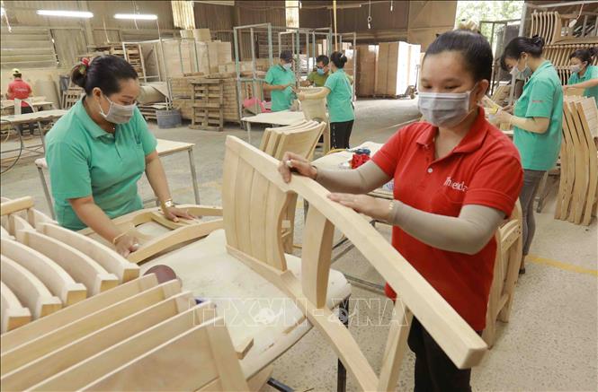 Wood products are among 37 key export items generating over 1 billion USD. VNA Photo: Vũ Sinh