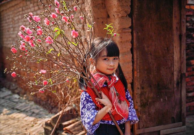  Tết là dịp trẻ nhỏ luôn háo hức mong chờ. Ảnh: Khánh Hòa – TTXVN