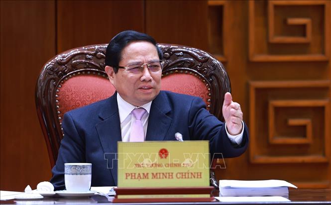 Prime Minister Pham Minh Chinh chairs the 10th meeting of the Government Steering Committee tasked with reviewing the implementation of the 12th Party Central Committee’s Resolution in Hanoi on January 13. VNA Photo: Dương Giang