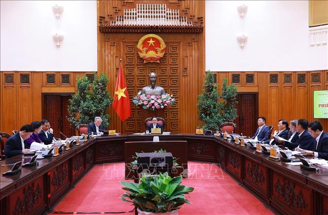 Prime Minister Pham Minh Chinh chairs the 10th meeting of the Government Steering Committee tasked with reviewing the implementation of the 12th Party Central Committee’s Resolution in Hanoi on January 13. VNA Photo: Dương Giang