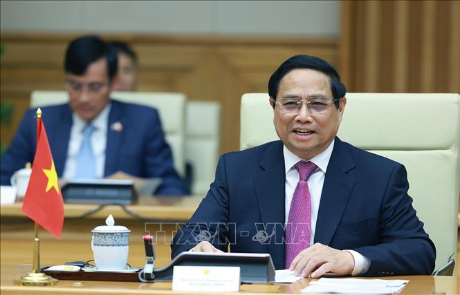 PM Pham Minh Chinh speaks at the talks. VNA Photo: Dương Giang 