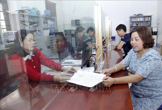 Bộ phận một cửa xã Vĩnh Thịnh, Vĩnh Tường. Ảnh: Hoàng Hùng-TTXVN