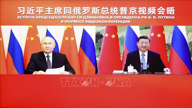 Tổng thống Nga Vladimir Putin và Chủ tịch Trung Quốc Tập Cận Bình tại cuộc hội đàm trực tuyến ngày 21/1/2025. Ảnh: THX/TTXVN