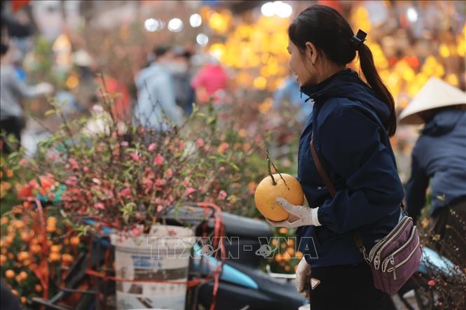 Tet atmosphere is surrounding. VNA Photo: Minh Quyết