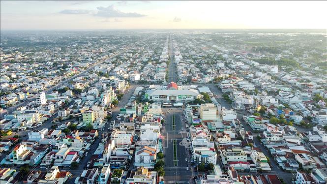 Gần 40 năm đổi mới, dưới sự lãnh đạo của Đảng, đời sống của người dân được cải thiện rõ rệt, hoàn thành về đích sớm các mục tiêu thiên niên kỷ. Trong ảnh: Thị xã Hòa Thành là 1 trong 4 đơn vị cấp huyện hoàn thành nhiệm vụ xây dựng nông thôn mới. Ảnh: Giang Phương – TTXVN