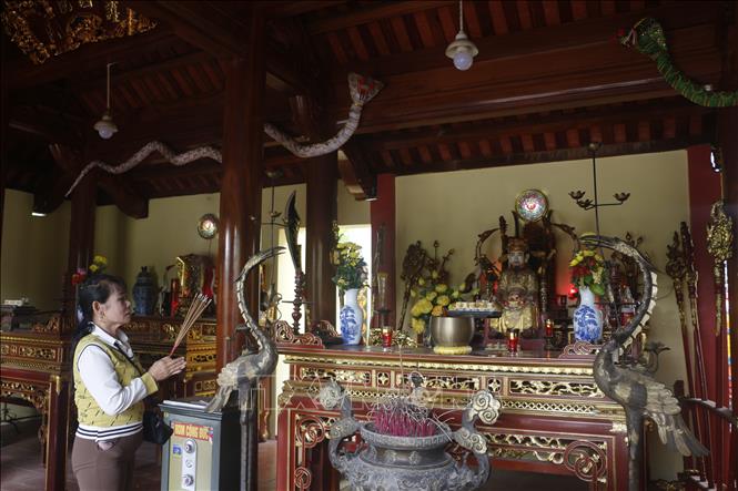 Tín ngưỡng thờ thần rắn là minh chứng rõ nét cho mối liên hệ mật thiết giữa con người với cội nguồn, với nền văn hóa nông nghiệp lúa nước. Ảnh: Bích Huệ - TTXVN