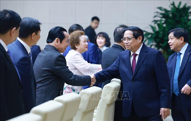 Thủ tướng Phạm Minh Chính với các doanh nghiệp tư nhân tham dự hội nghị. Ảnh: Dương Giang-TTXVN 

