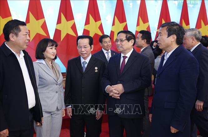 Thủ tướng Phạm Minh Chính với các doanh nghiệp. Ảnh:Dương Giang-TTXVN