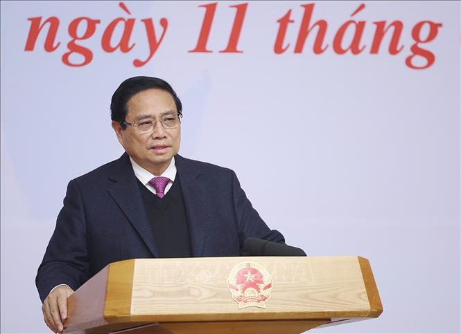 Thủ tướng Phạm Minh Chính khai mạc Hội nghị Thường trực Chính phủ làm việc với các ngân hàng thương mại. Ảnh: Dương Giang-TTXVN 
