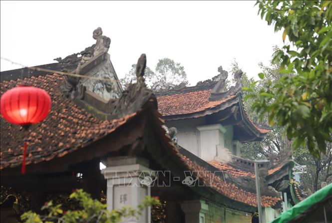 Tòa Thượng điện có kiến trúc chồng diêm 4 mái, đầu đao cong và toà Trung điện có kết trúc chồng diêm 8 mái riêng biệt. Ảnh: Xuân Tiến - TTXVN 