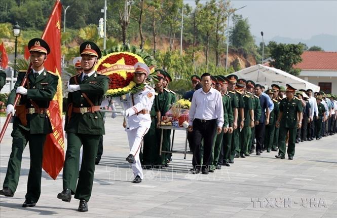  Tỉnh Hà Giang tổ chức lễ truy điệu và an táng hài cốt liệt sỹ hy sinh trong cuộc chiến đấu bảo vệ biên giới phía Bắc về Nghĩa trang Liệt sỹ Quốc gia Vị Xuyên (2023). Ảnh: Minh Tâm-TTXVN