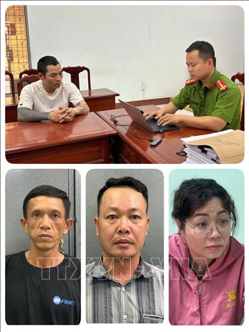 Nhóm đối tượng tại cơ quan chức năng. Ảnh: TTXVN phát