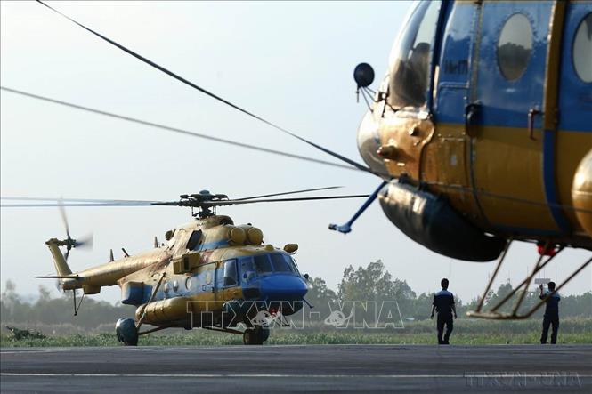 Máy bay trực thăng Mi-171 của Sư đoàn không quân 370 tham gia tìm kiếm, cứu nạn máy bay MH 370 của Malaysia bị mất tích (3/2014). Ảnh: Duy Khương - TTXVN