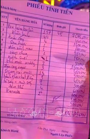 Phiếu tính tiền hơn 14 triệu đồng của quán karaoke T.C được khách hàng đăng lên mạng xã hội. Ảnh: TTXVN phát