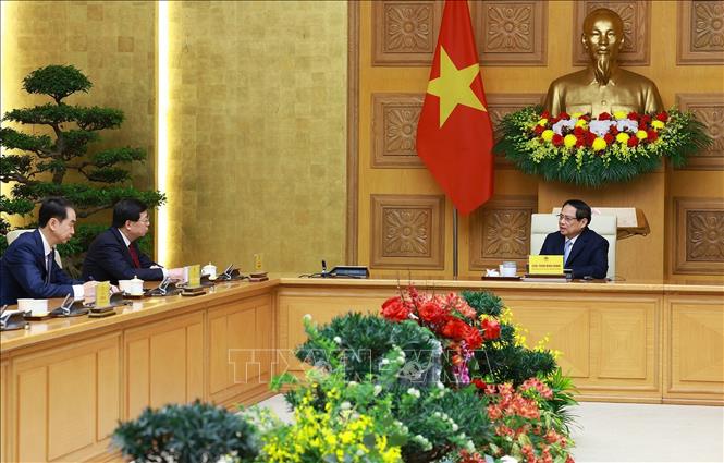 Thủ tướng Phạm Minh Chính tiếp đồng chí Khưu Dũng, Bí thư Đảng uỷ Đại học Thanh Hoa, Trung Quốc. Ảnh: Dương Giang-TTXVN 