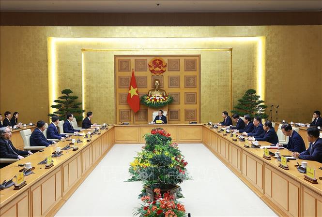 Thủ tướng Phạm Minh Chính tiếp đồng chí Khưu Dũng, Bí thư Đảng uỷ Đại học Thanh Hoa, Trung Quốc. Ảnh: Dương Giang-TTXVN 