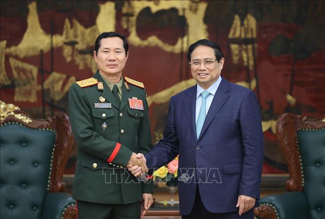 Thủ tướng Phạm Minh Chính tiếp Trung tướng Saichay Kommasith, Thứ trưởng Bộ Quốc phòng, Tổng Tham mưu trưởng Quân đội nhân dân Lào. Ảnh: Dương Giang-TTXVN