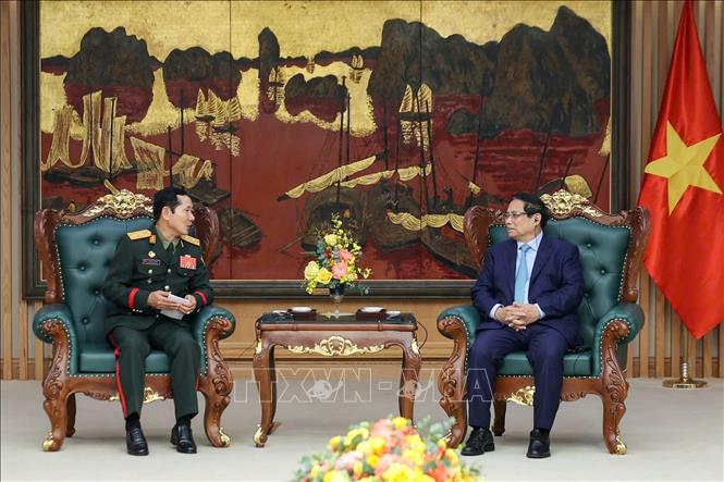Thủ tướng Phạm Minh Chính tiếp Trung tướng Saichay Kommasith, Thứ trưởng Bộ Quốc phòng, Tổng Tham mưu trưởng Quân đội nhân dân Lào. Ảnh: Dương Giang-TTXVN