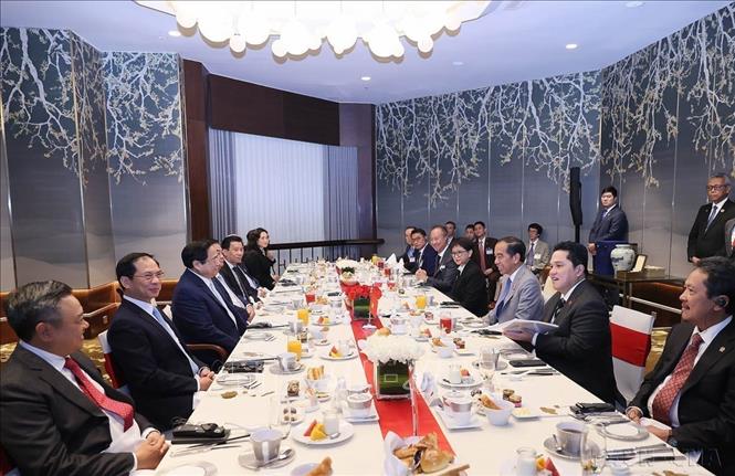 Thủ tướng Phạm Minh Chính và Tổng thống Indonesia Joko Widodo cùng ăn sáng và làm việc (Hà Nội, 13/1/2024). Ảnh: Dương Giang-TTXVN