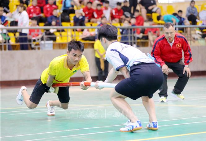 Các vận động viên nam tranh tài ở nội dung 60kg. Ảnh: Trung Kiên - TTXVN