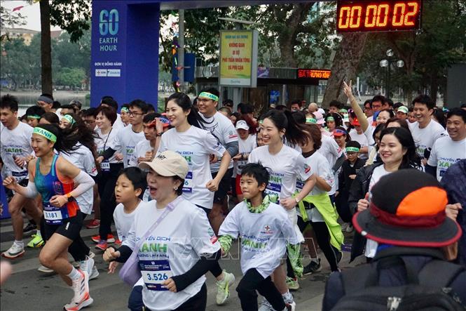 People take part in the running event. VNA Photo: Trần Việt