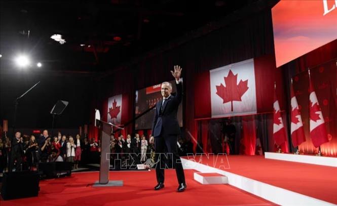Ông Mark Carney mừng chiến thắng sau khi được bầu làm lãnh đạo đảng Tự do cầm quyền Canada tại thủ đô Ottawa, ngày 9/3/2025. Ảnh: REUTERS/TTXVN  