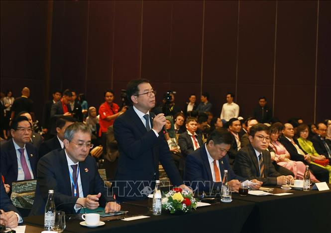 Businesses attend the dialogue. VNA Photo: Thống Nhất 