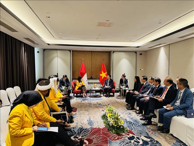 Đồng chí Nguyễn Xuân Thắng và bà Meutya Viada Hafid tại cuộc gặp. Ảnh: Đỗ Quyên - PV TTXVN tại Indonesia