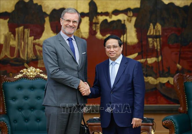 PM Pham Minh Chinh reeceives EDF's Senior VP Government and International Affairs Erkki Maillard. VNA Photo: Dương Giang