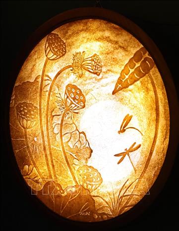 The vivid dimension and shapes of a Truc Chi art piece. VNA Photo